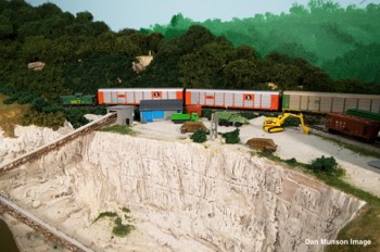 Autoracks passing Tavern Rock quarry at St. Charles